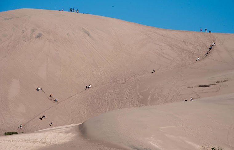 Unusual Travel Bucket List Ideas In The USA Sand boarding